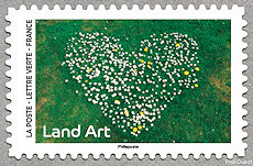 Image du timbre Marguerites en forme de coeur sur herbe